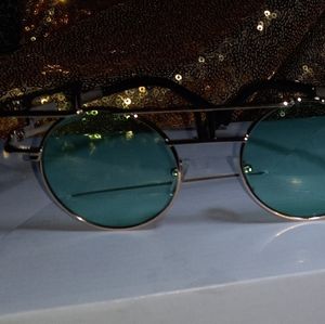 High fashion sunglasses with green tint